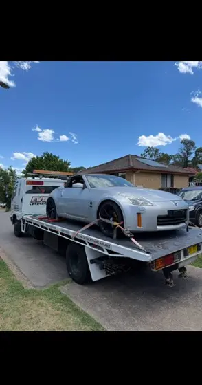 Silver Nissan 350Z roadster secured on the Evolution tilt tray