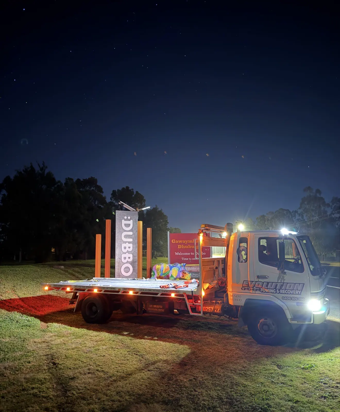 The Evolution tilt tray parked at night under the stars on a long-distance run