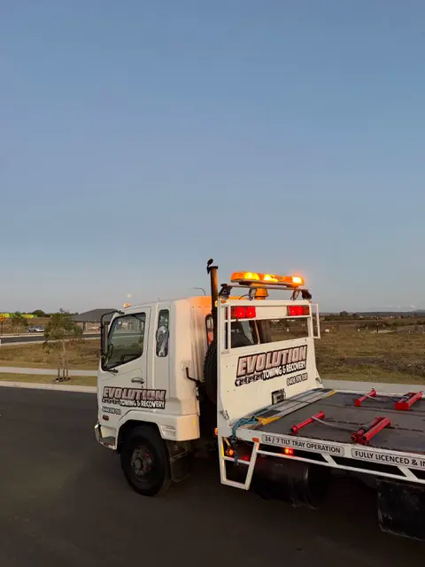 The Evolution Towing tilt tray at dusk